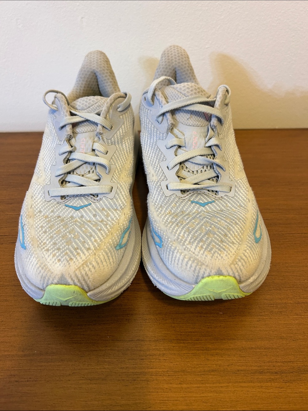 Hoka White Running Shoes with Blue, Green and Pink Accents